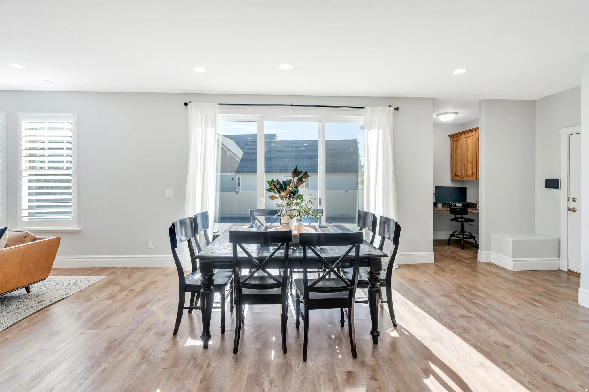 Dining area with recessed lighting, and built in study nook
