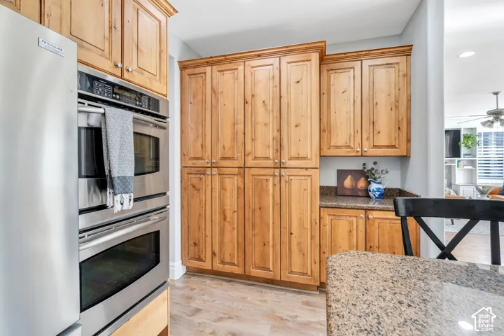 Kitchen featuring stainless steel appliances, granite counters