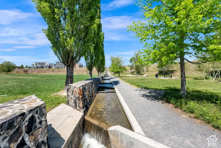 Walking trails, and grassy areas, with mature trees