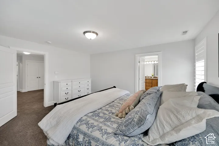 Primary bedroom with ensuite attached