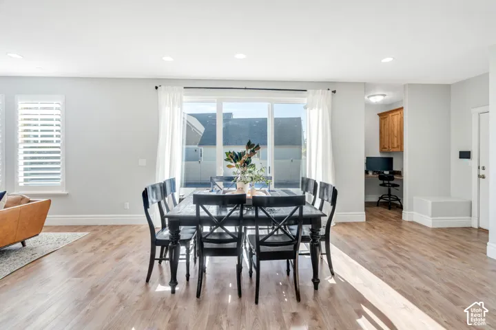 Dining area with recessed lighting, and built in study nook