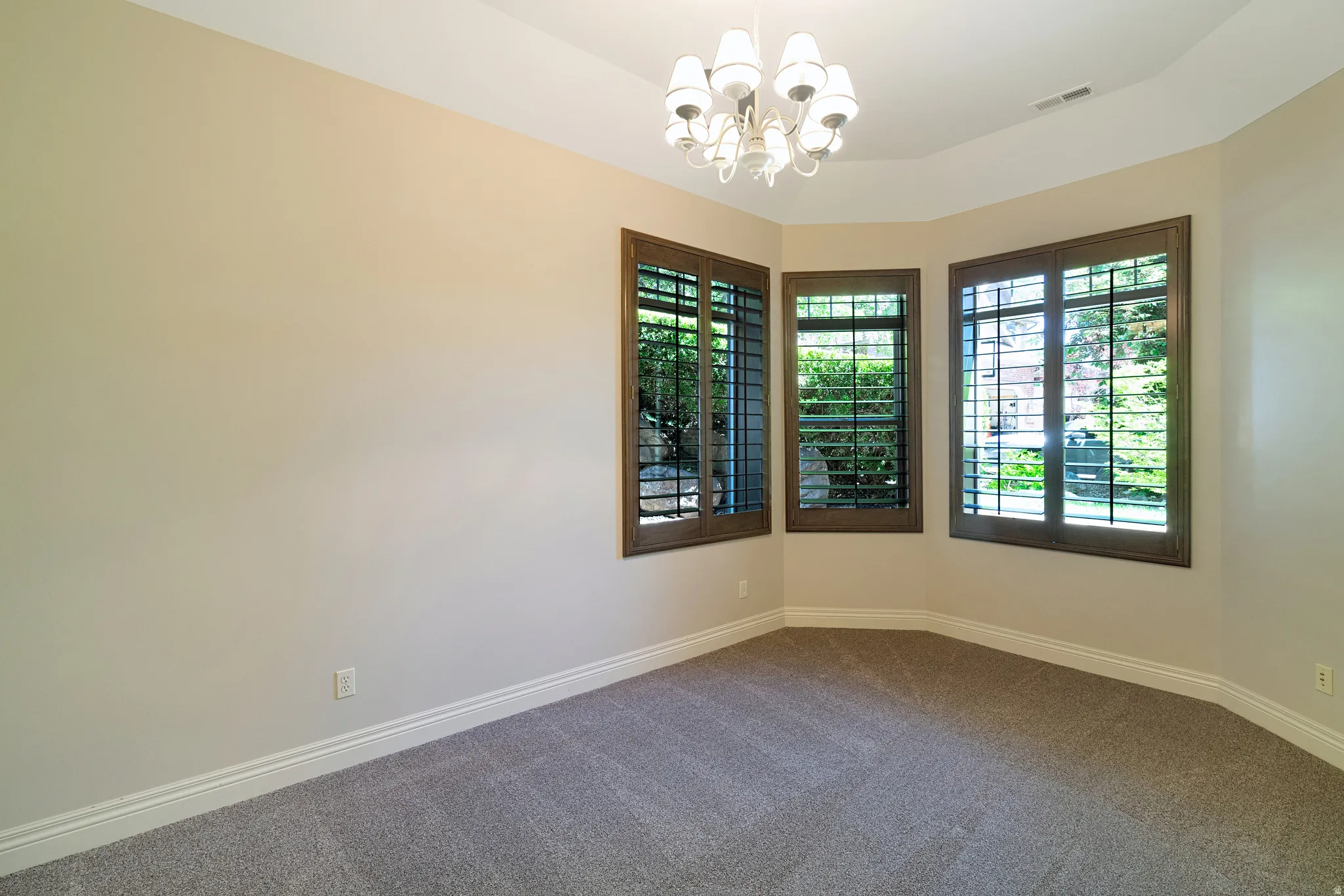 Tray ceiling with a decorative chandelier