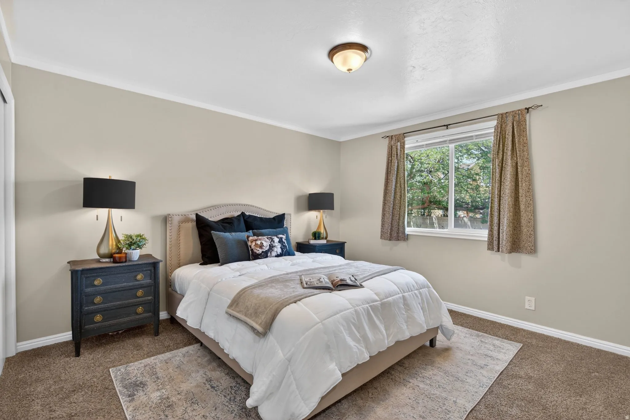 Neutral-toned walls complement plush carpeting