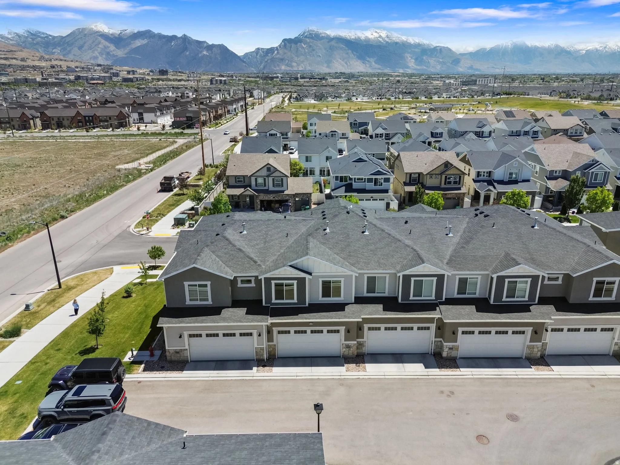 Modern townhome development featuring a row of attached units