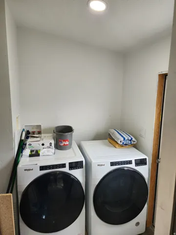 Dedicated laundry area with recessed lighting