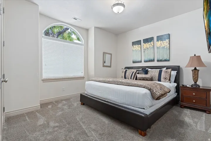 Arched window with light-filtering blinds
