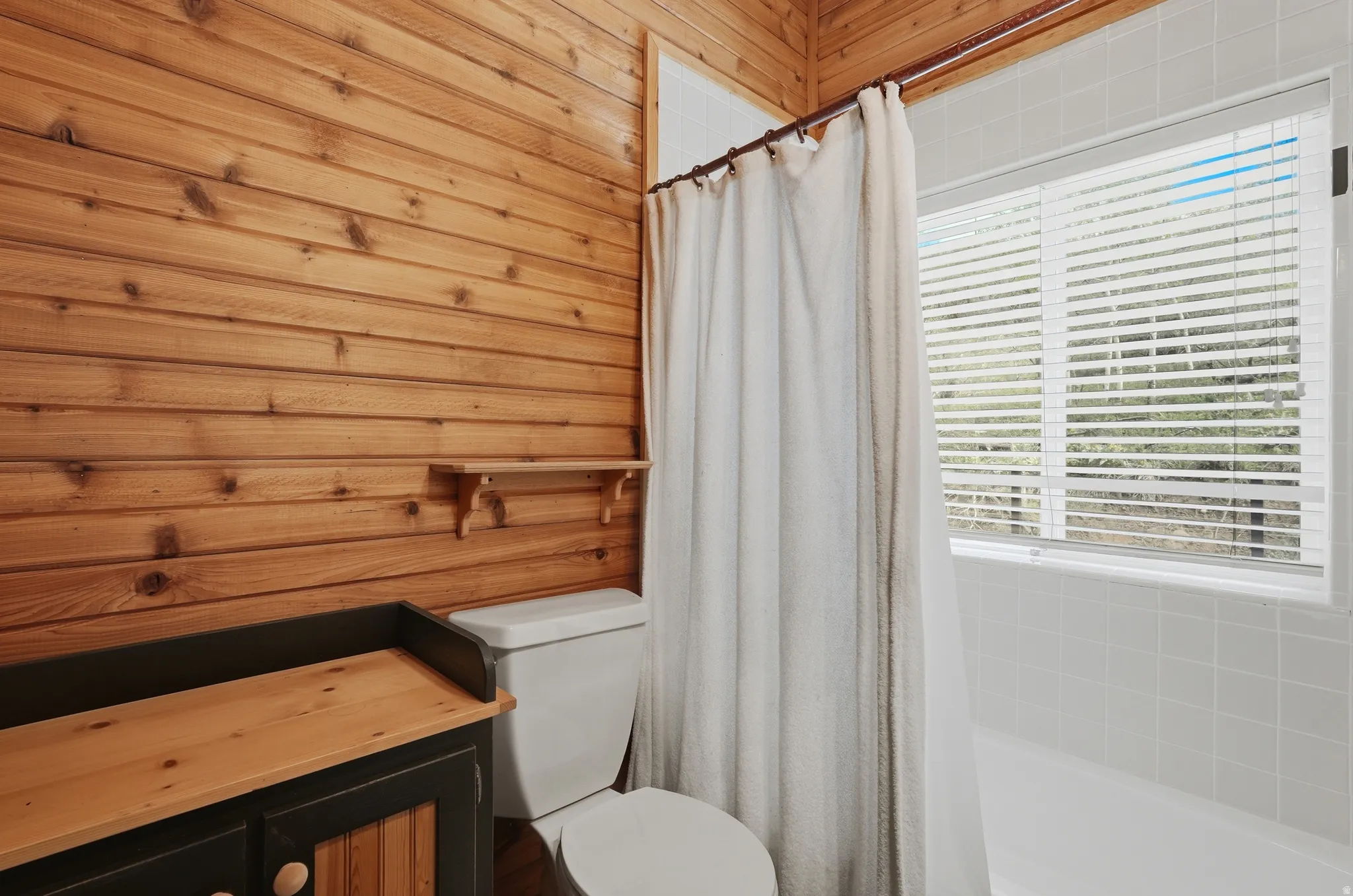 Primary bedroom on the main level with ensuite bathroom