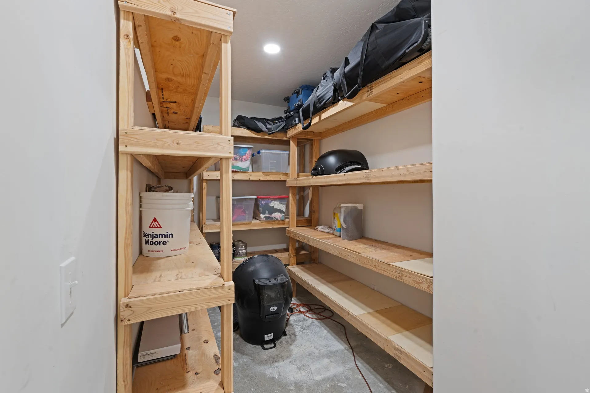 Built-in wooden shelving units providing ample storage capacity