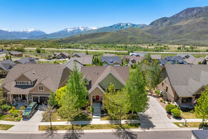 Mountain backdrop framing a residential neighborhood with varied architectural styles