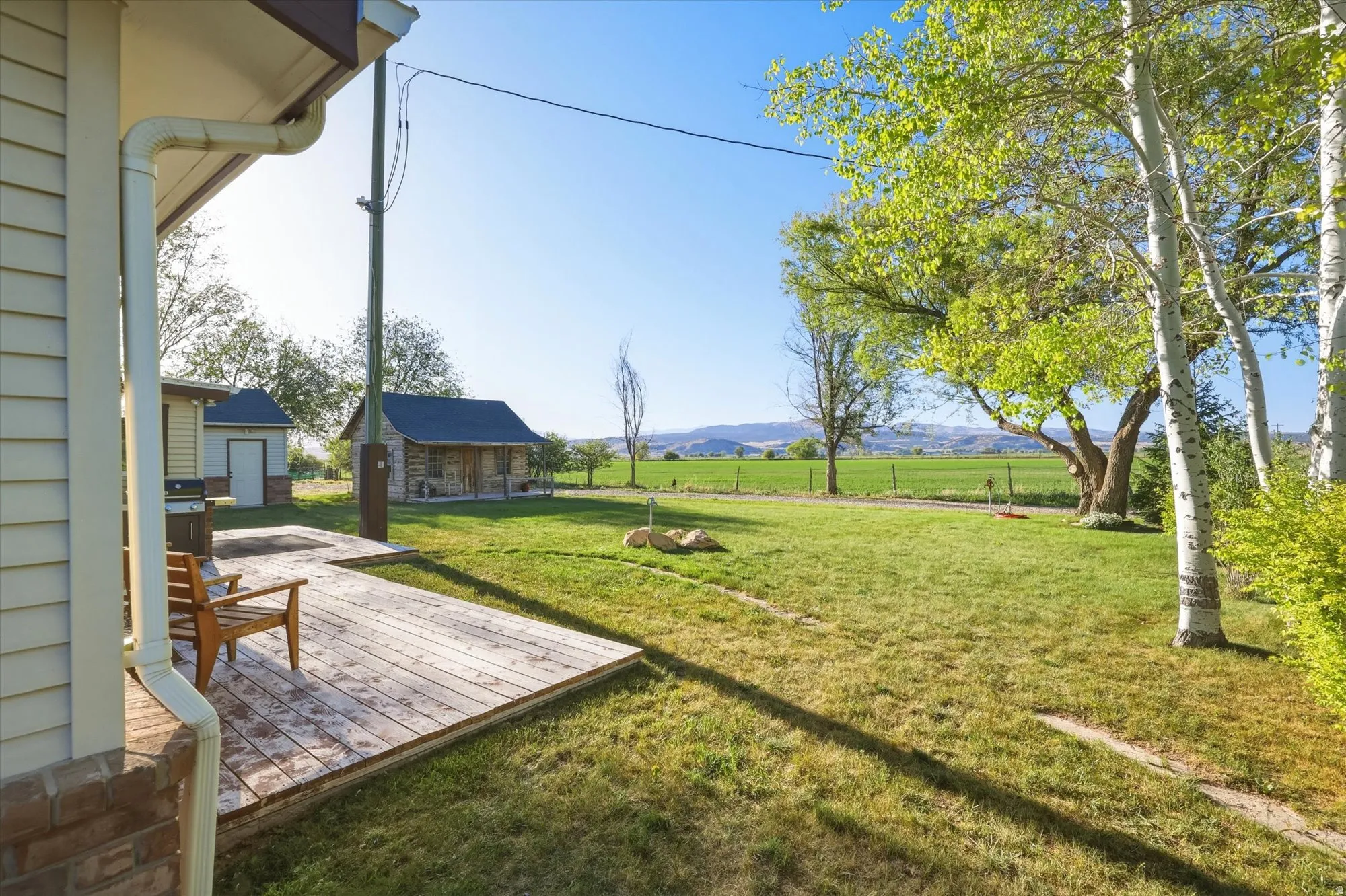 Expansive outdoor deck with natural wood planks