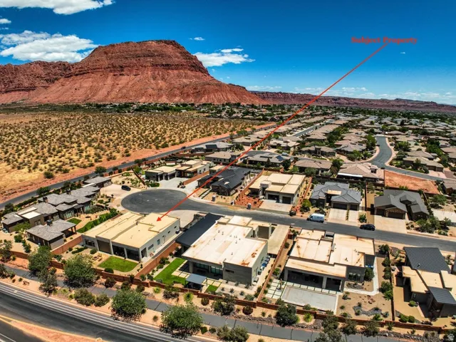 Residential neighborhood featuring a cul-de-sac and desert landscaping