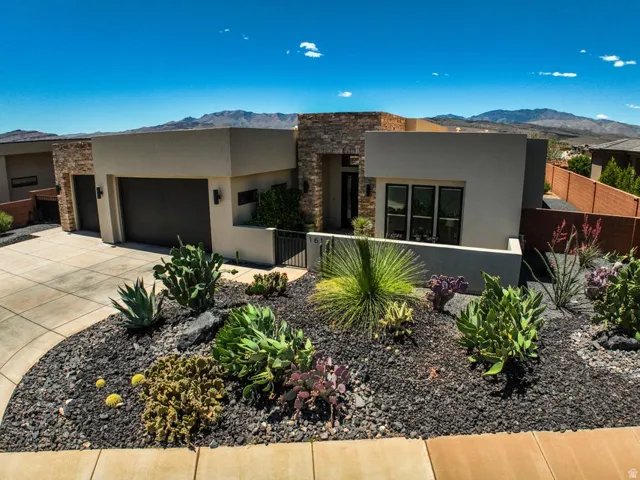 Contemporary exterior with stucco and stone accents