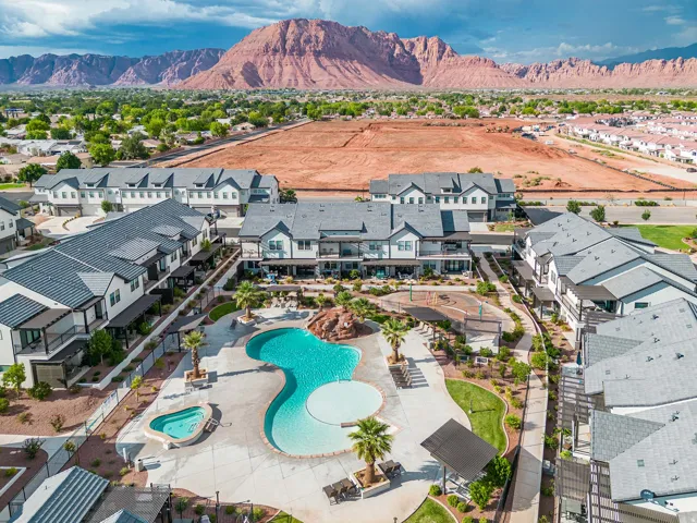 Community amenities featuring a resort-style swimming pool, separate spa, and dedicated playground area