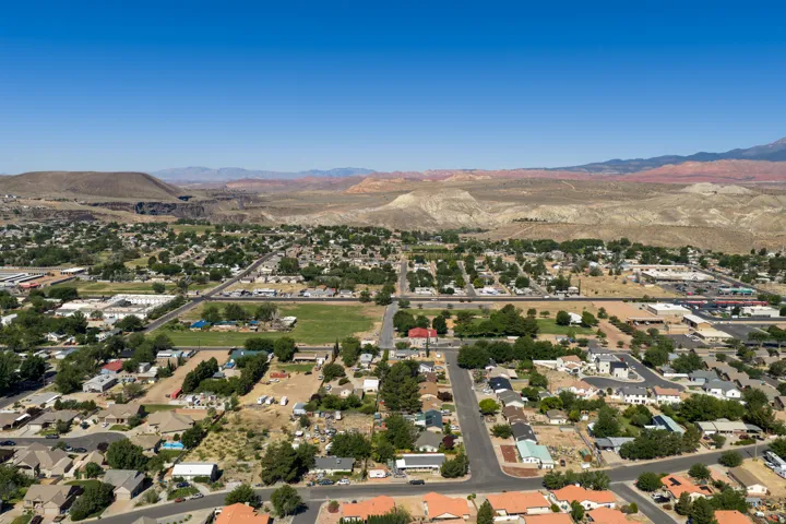 Expansive aerial perspective showcasing a residential community with varied architectural styles