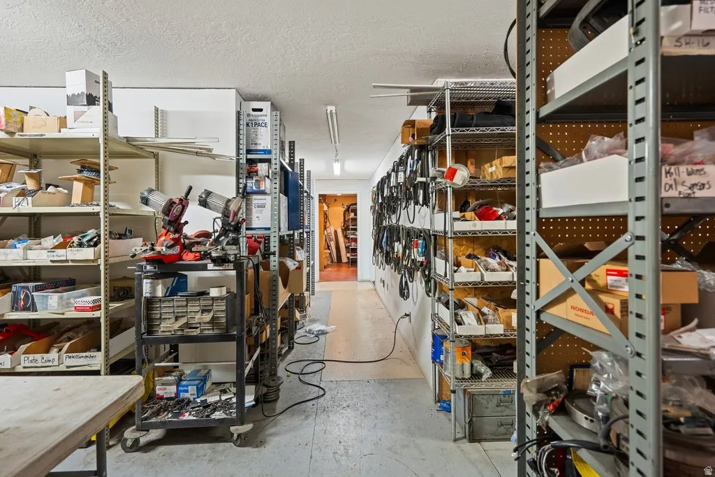 Storage area featuring multiple industrial-style metal shelving units
