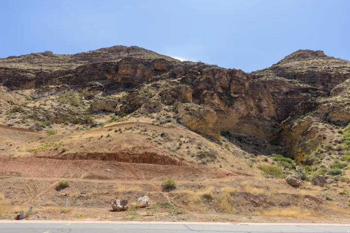 Mountainous terrain with natural rock formations and varied vegetation