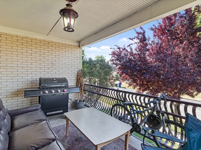 Front balcony for your grill or to sit and watch the world go by-