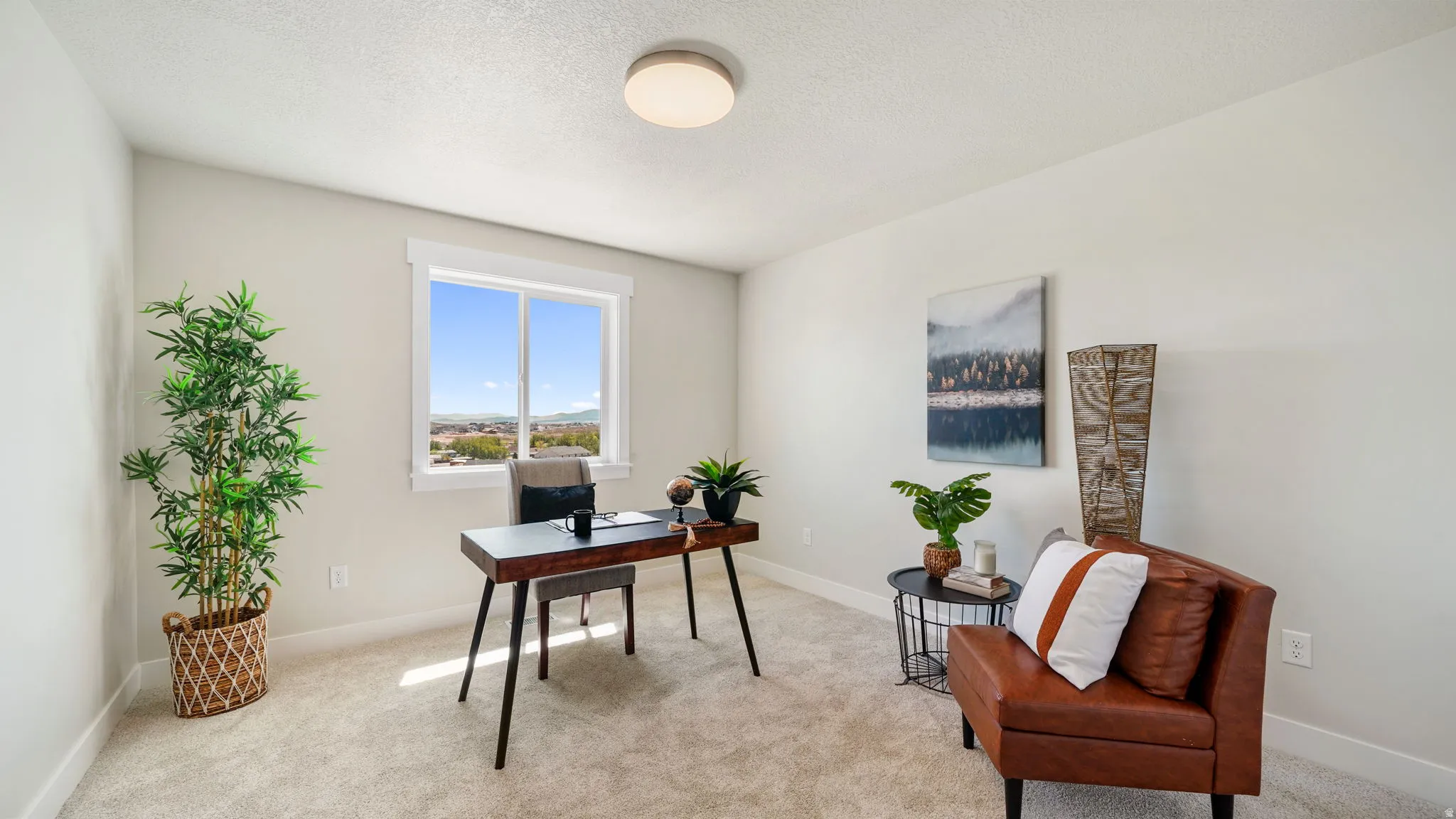 Neutral wall tones, carpeted flooring, and a single window with white trim