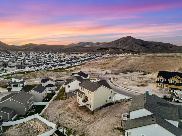 Expansive residential development featuring modern homes with mountain scenery