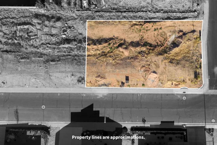 Expansive undeveloped parcel featuring varied topography and direct street frontage