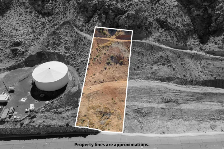 Rectangular parcel of undeveloped land with varied terrain