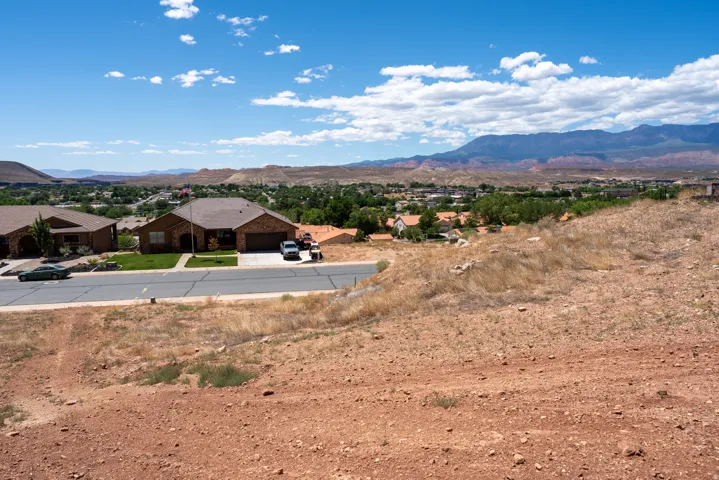 Expansive desert landscape with distant mountain ranges