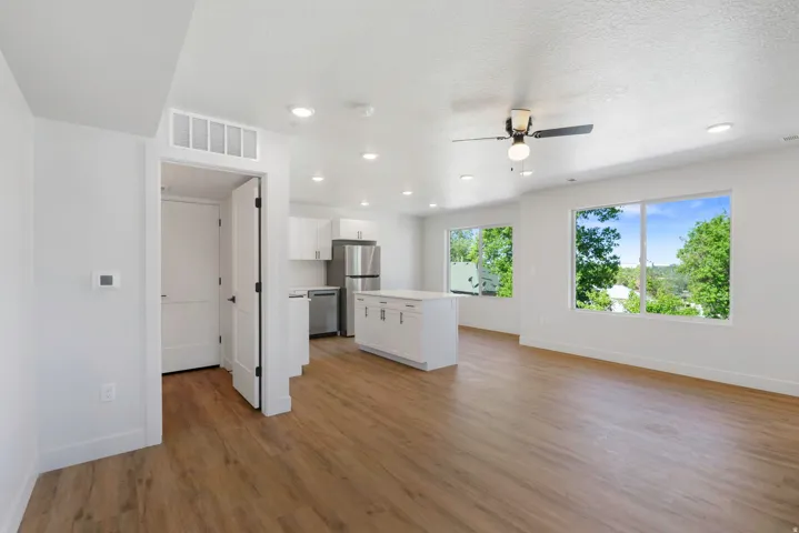 Open kitchen, dining, and living space