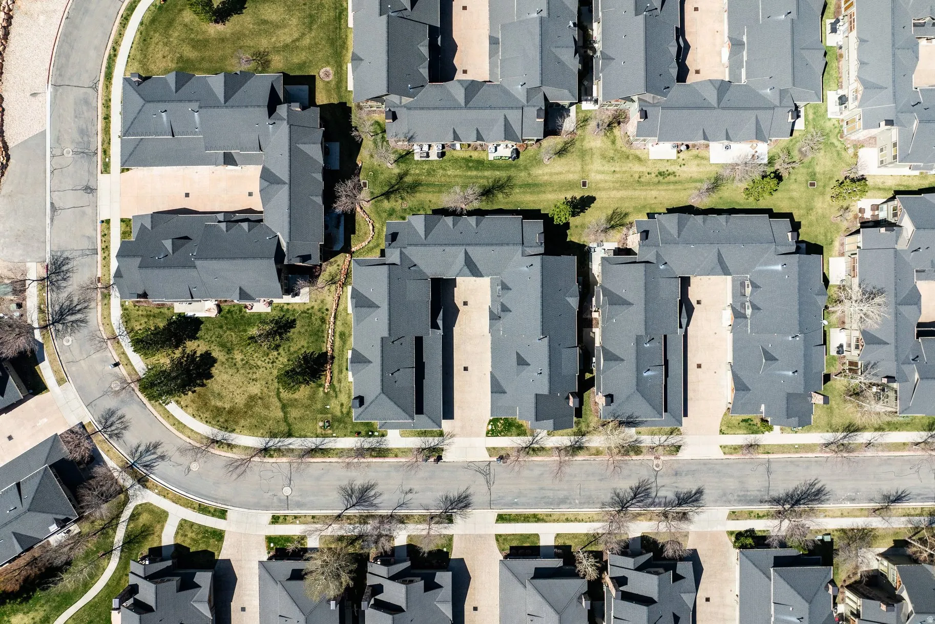 Residential community featuring dark-shingled rooftops and established streetscapes