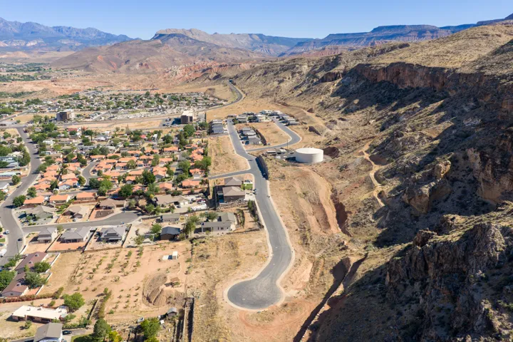 Aerial perspective showcasing established residential areas and undeveloped land parcels