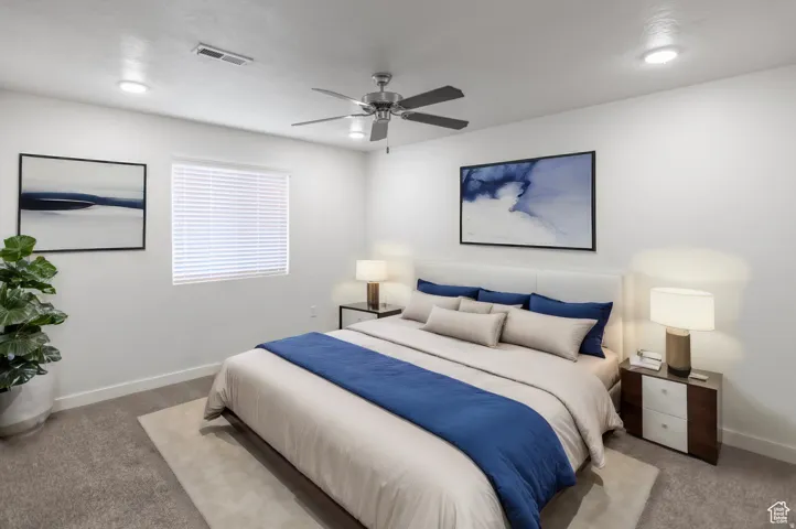 Bedroom featuring a ceiling fan, recessed lighting, white window blinds, and gray carpeting