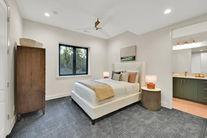 Bedroom featuring recessed lighting, a modern ceiling fan with gold accents, and patterned carpet flooring