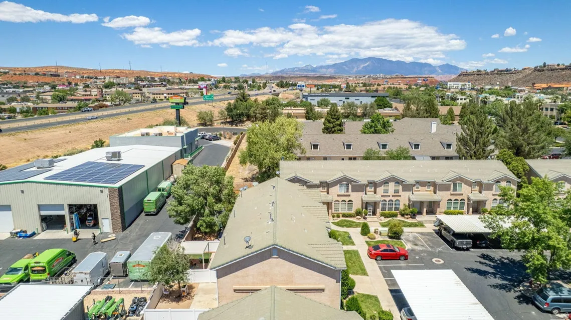 Aerial perspective showcasing townhome structures with pitched roofs