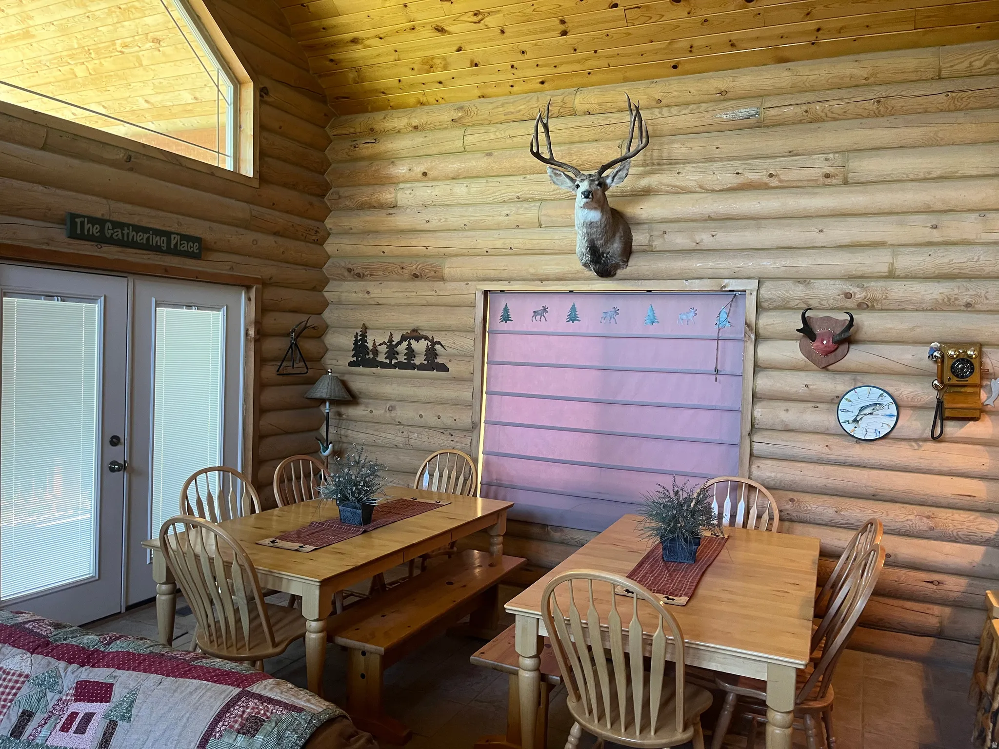 Log cabin interior featuring natural wood walls and ceiling