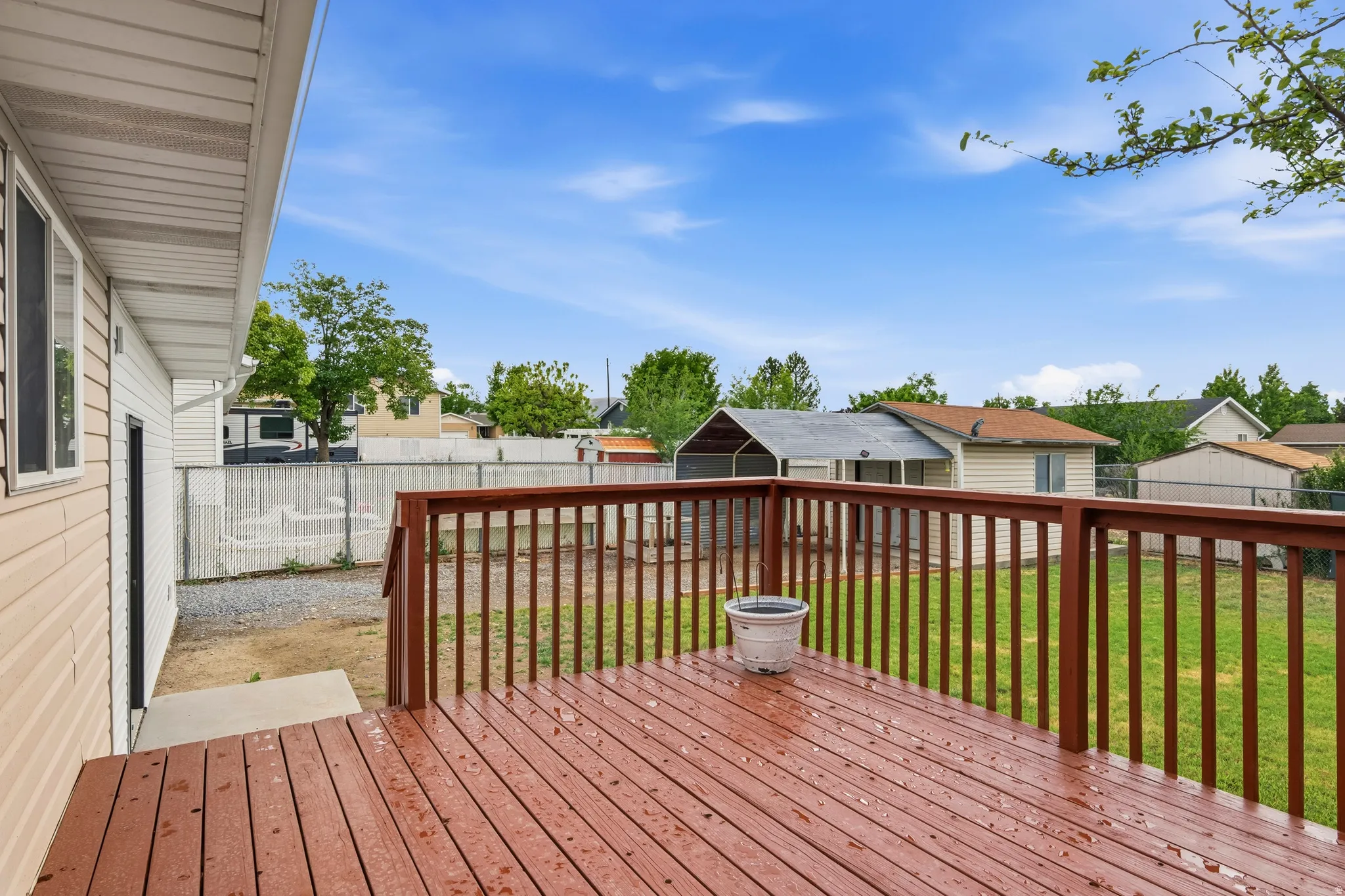 Expansive wood deck with rich red stain