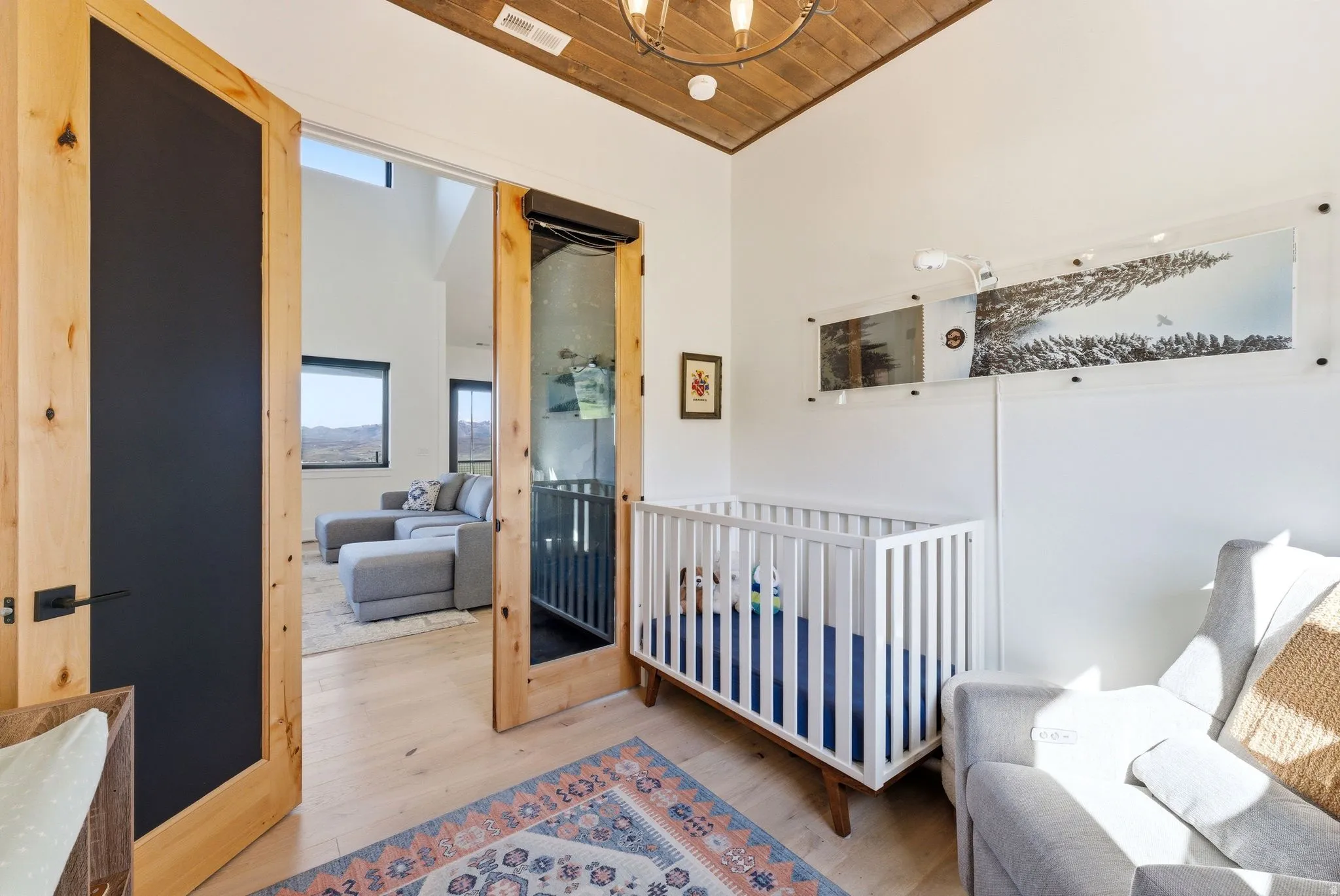 Room featuring light wood-finish flooring, a wood-paneled ceiling, and recessed lighting