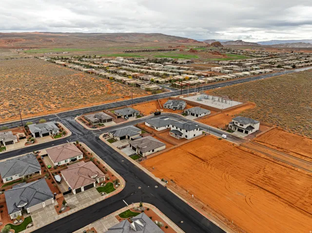 Established neighborhood featuring asphalt streets and concrete driveways