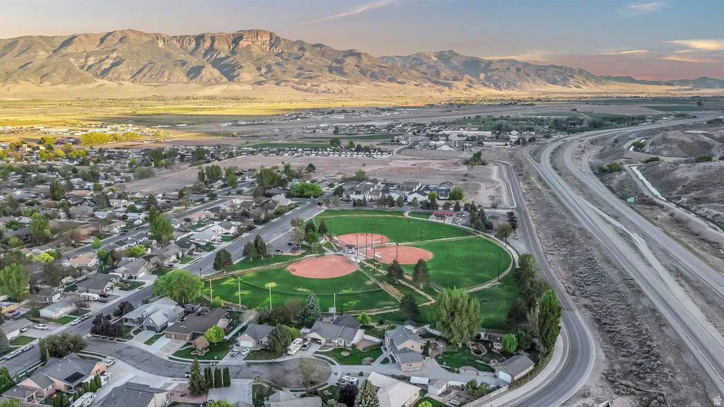 Aerial perspective showcasing a residential community with abundant green spaces
