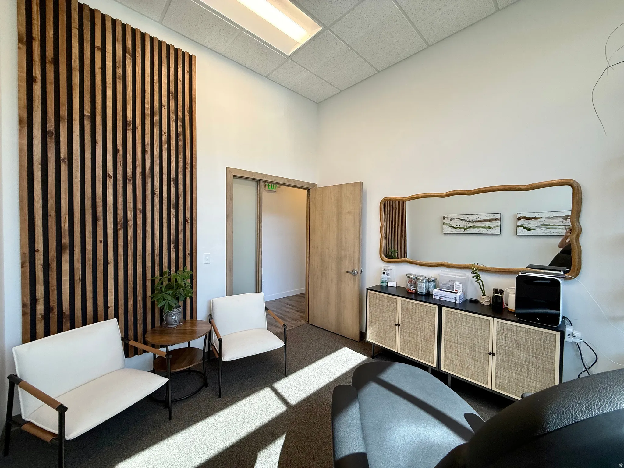 Accent wall featuring vertical wood slat detailing