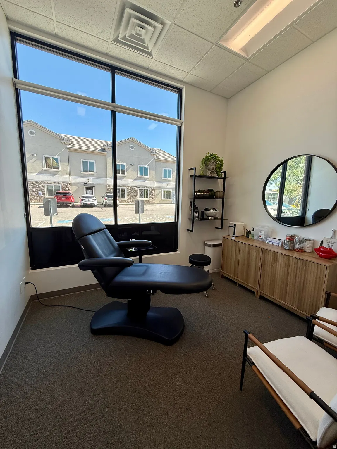 Large storefront window with black framing