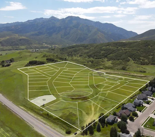 Aerial overview of a developed subdivision featuring demarcated lots and existing residential structures