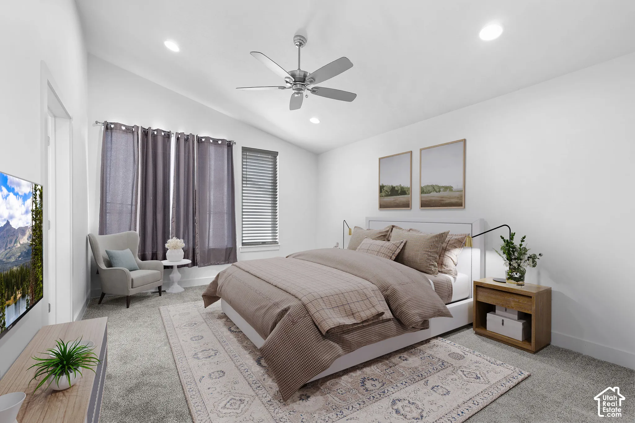 Vaulted ceiling with recessed lighting and a ceiling fan, light gray carpeting, and multiple windows with blinds and draperies