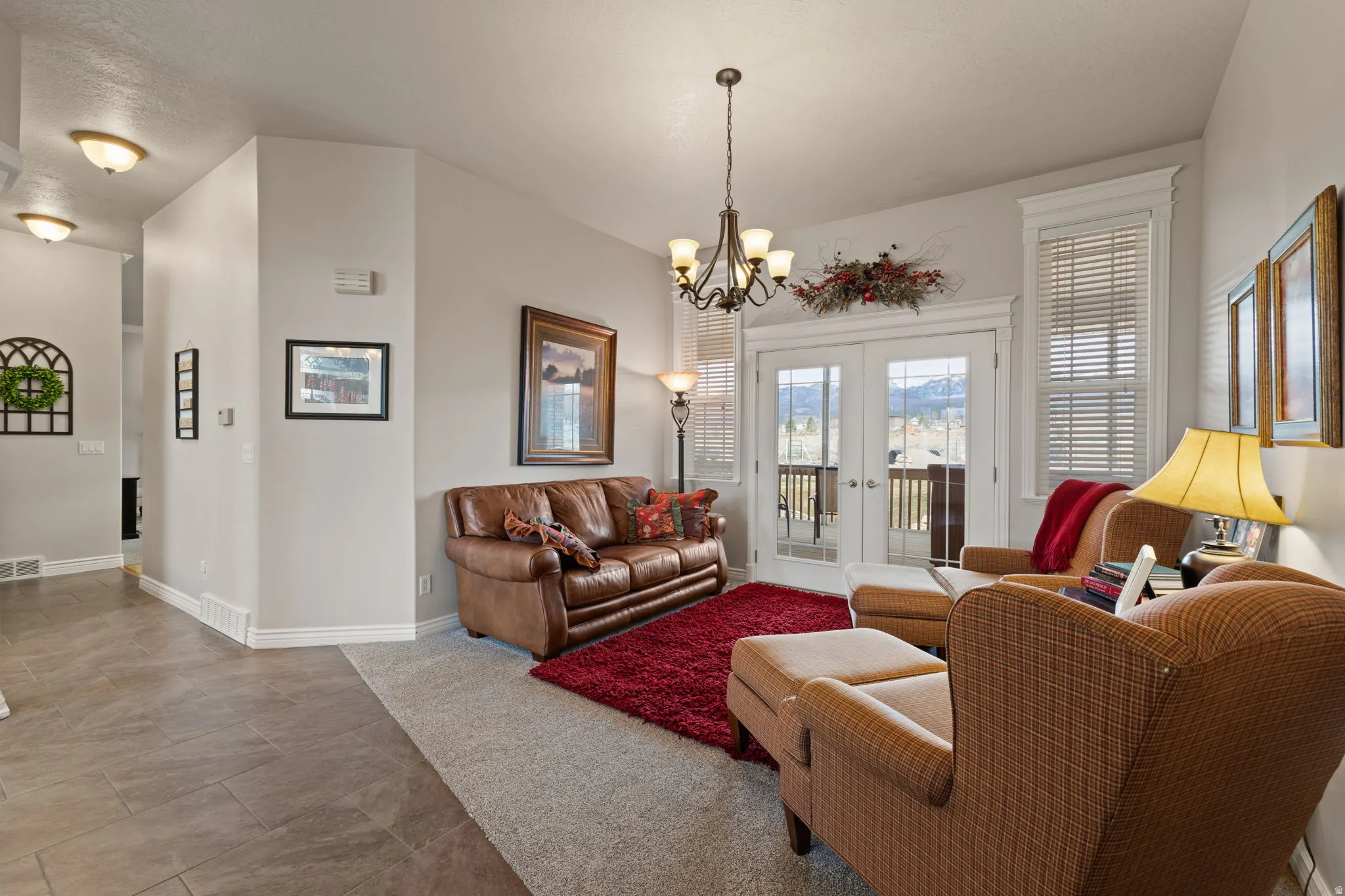 Formal Livingroom with double French doors to the Lanai