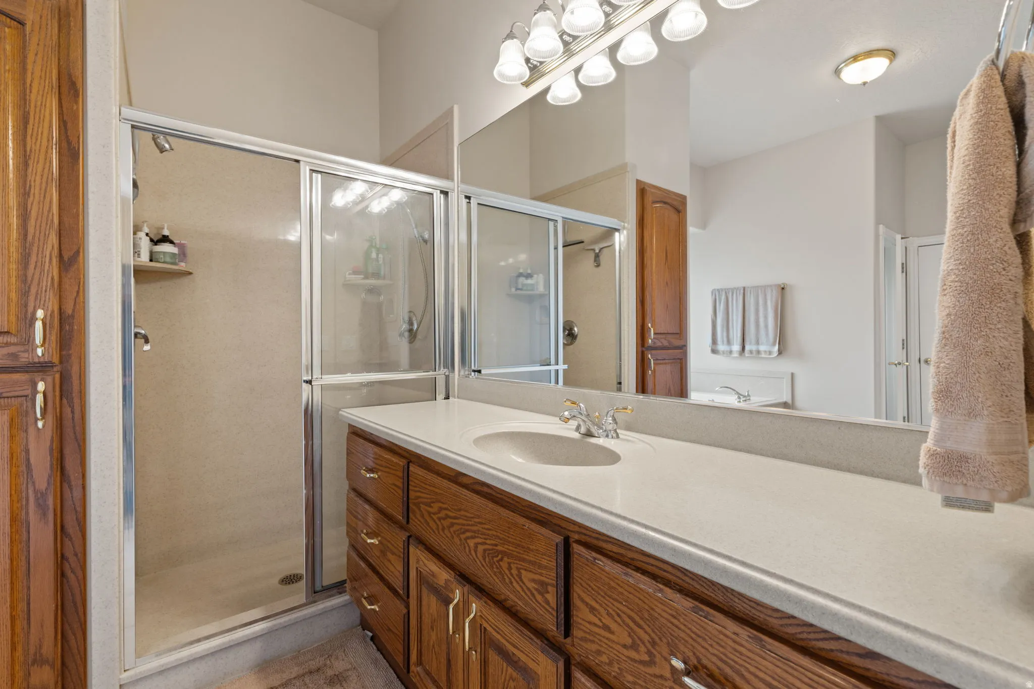 Primary en-suite with separate shower and large vanity