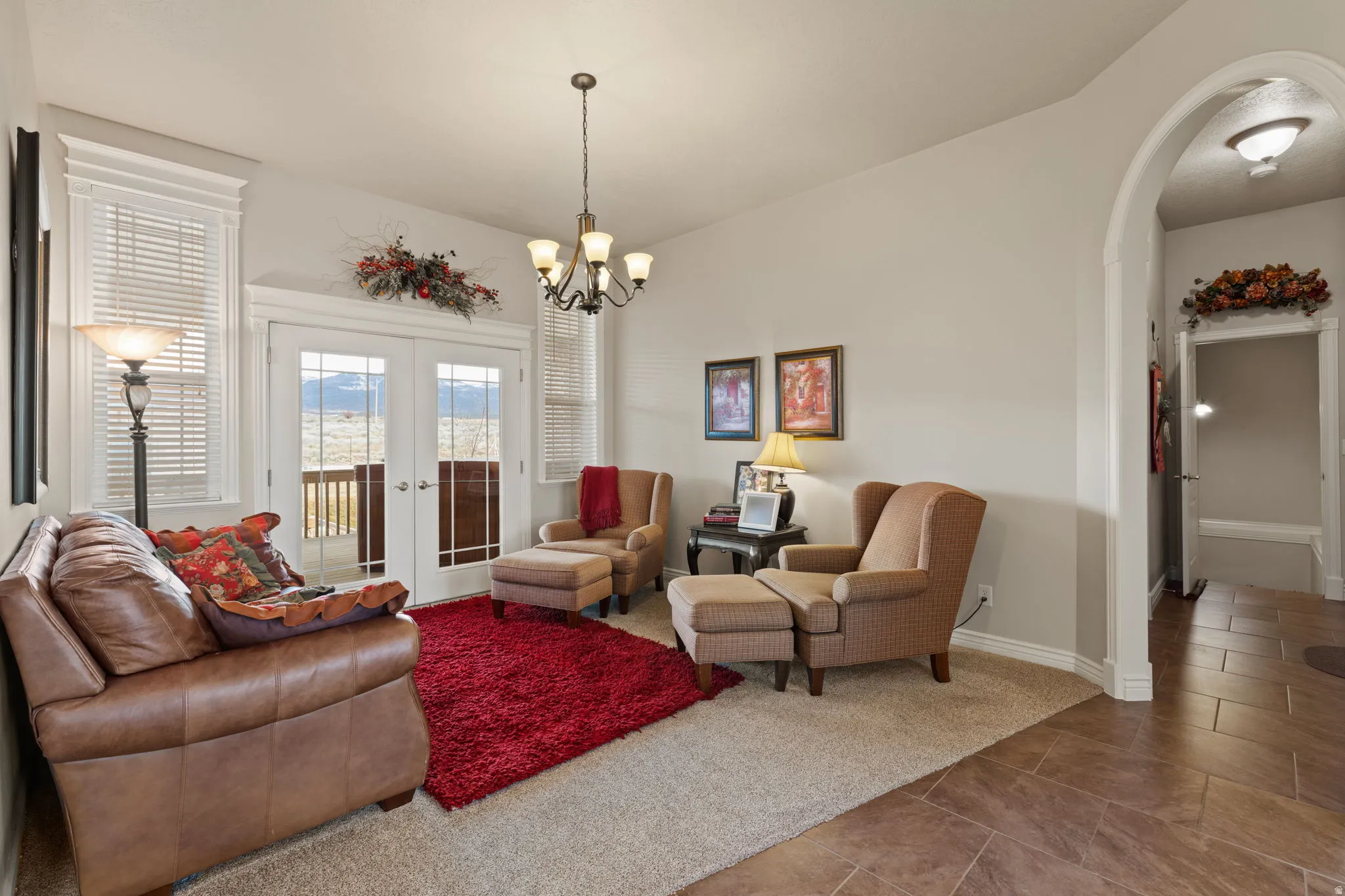 Formal Livingroom with double French doors to the Lanai