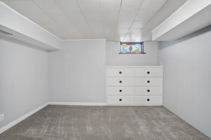 Recessed window featuring stained glass accents