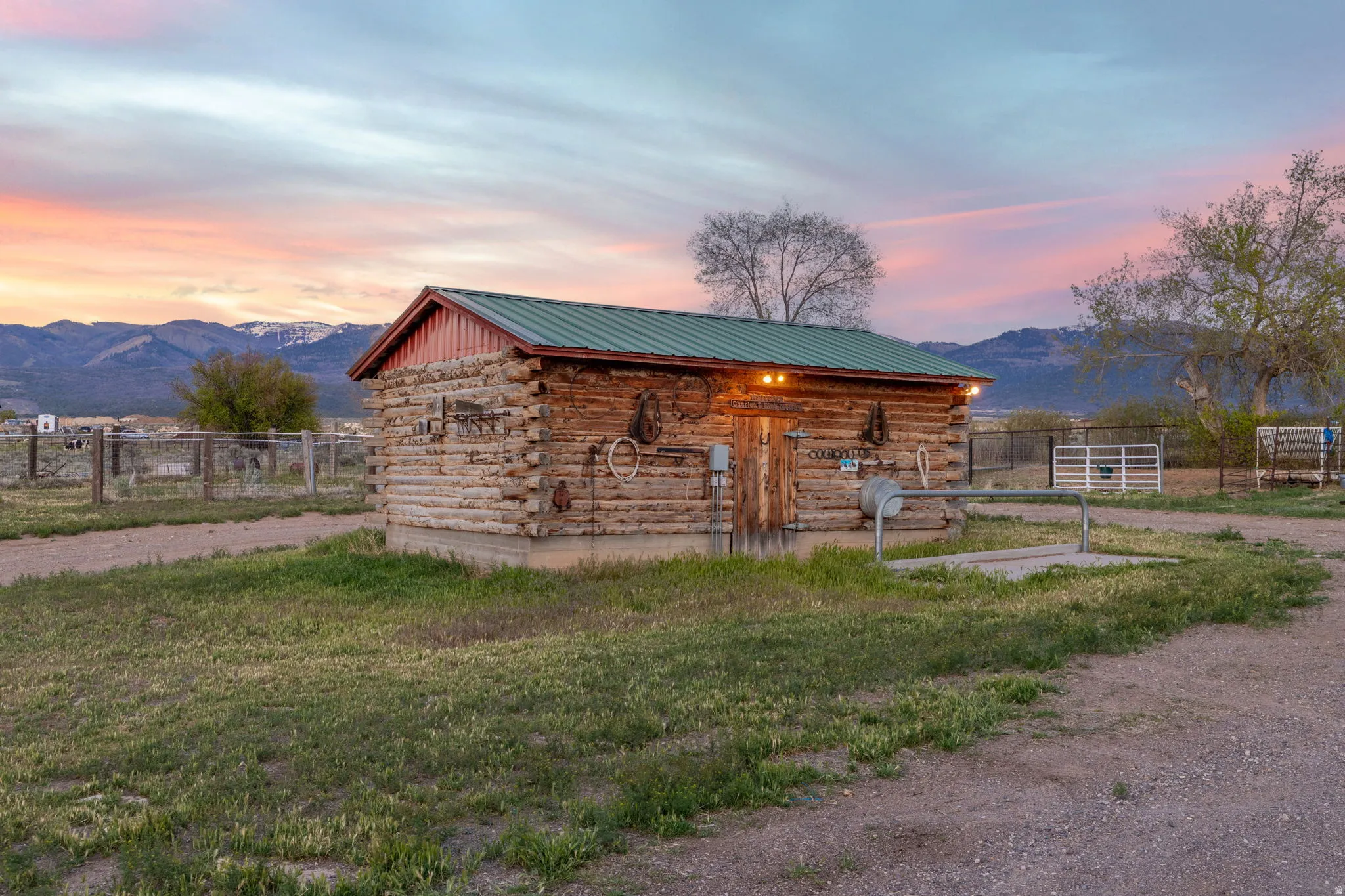 Log cabin tack shed with power and hitching post