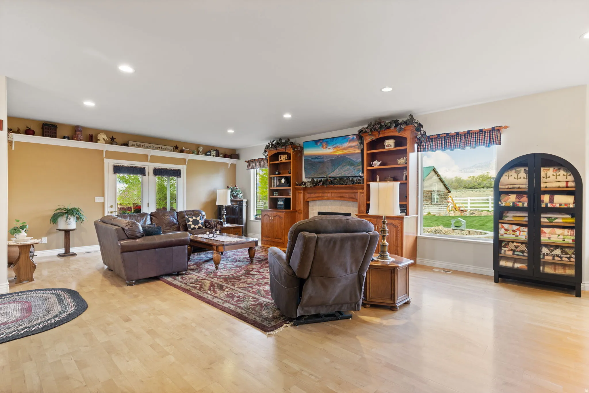 Spacious family/great-room with custom built-ins and propane fireplace