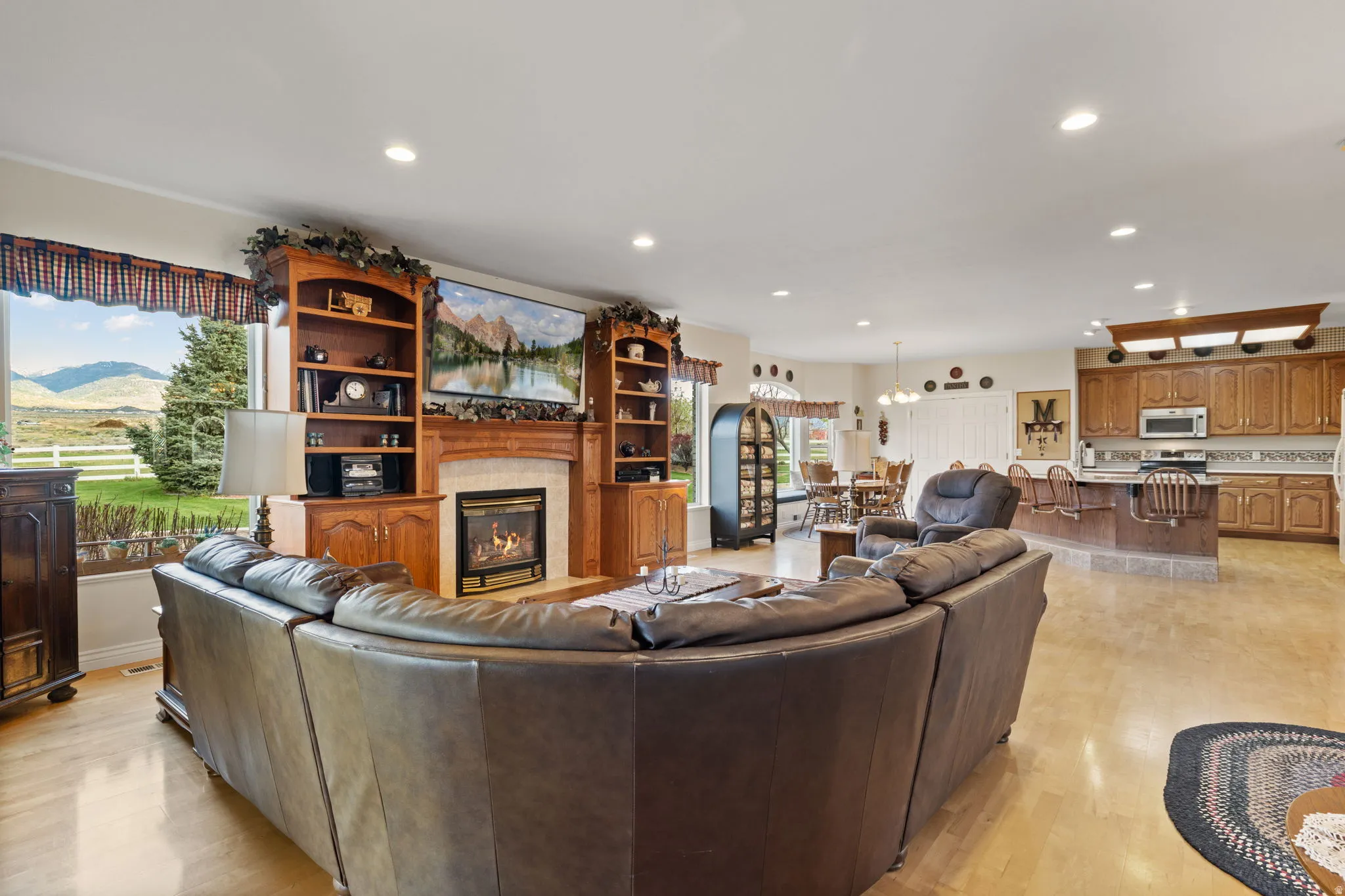 Spacious family/great-room with custom built-ins and propane fireplace