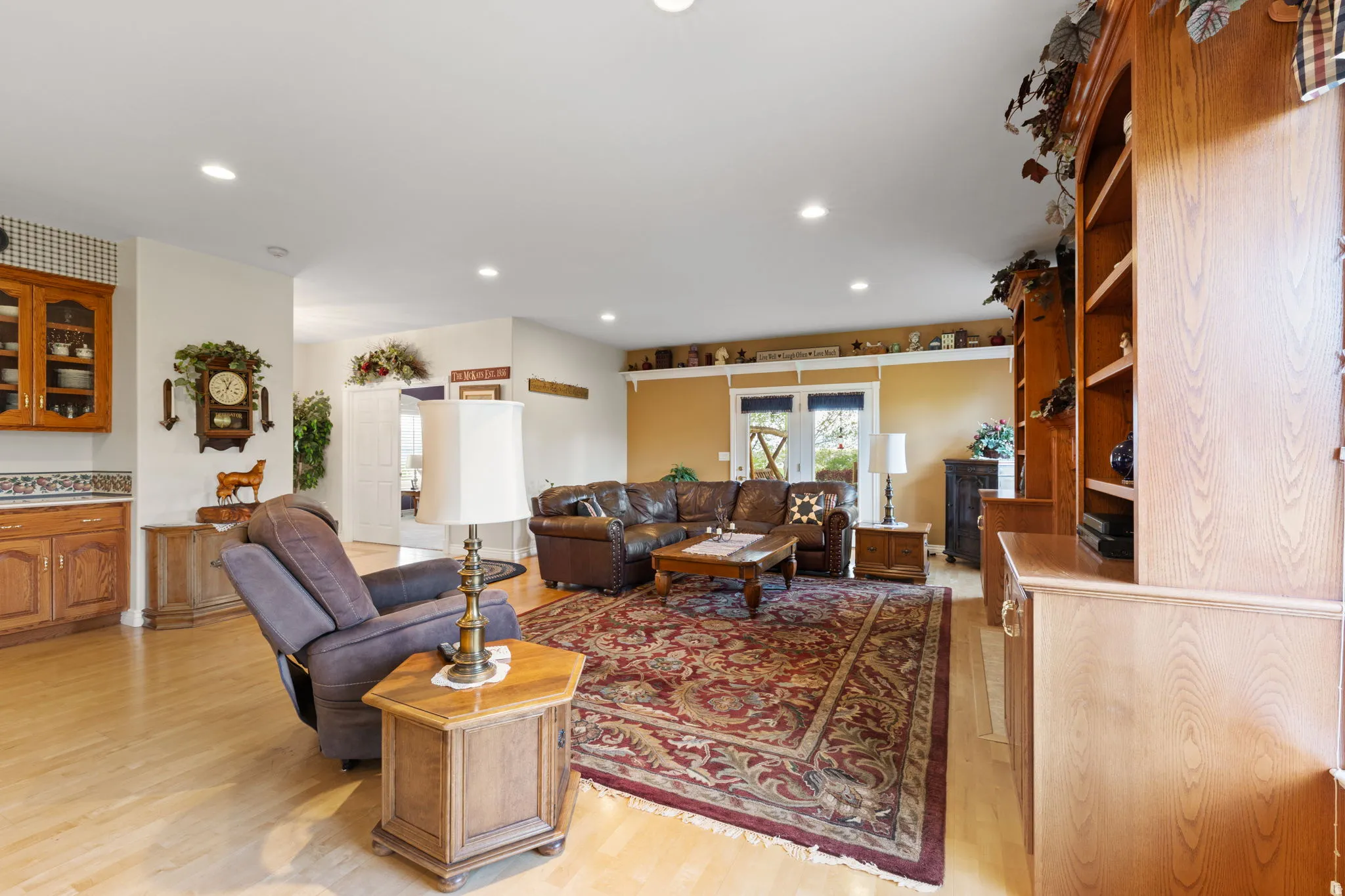Spacious family/great-room with custom built-ins and propane fireplace