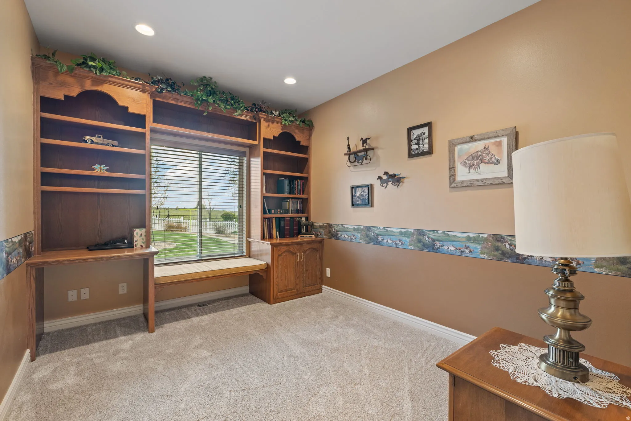 Bedroom number 2, that has been converted into an office with built-ins
